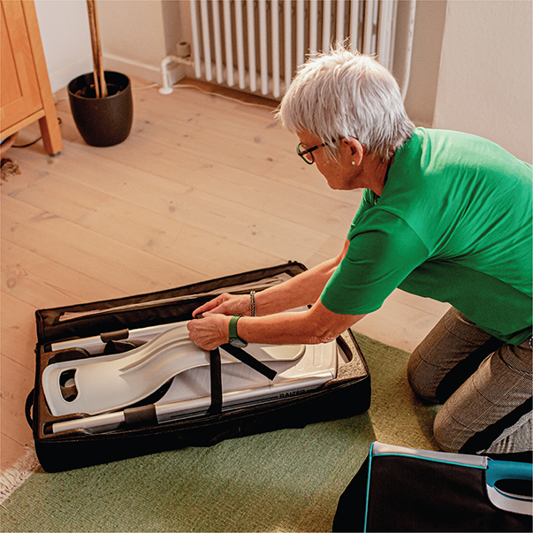 woman unpacking a Raizer M