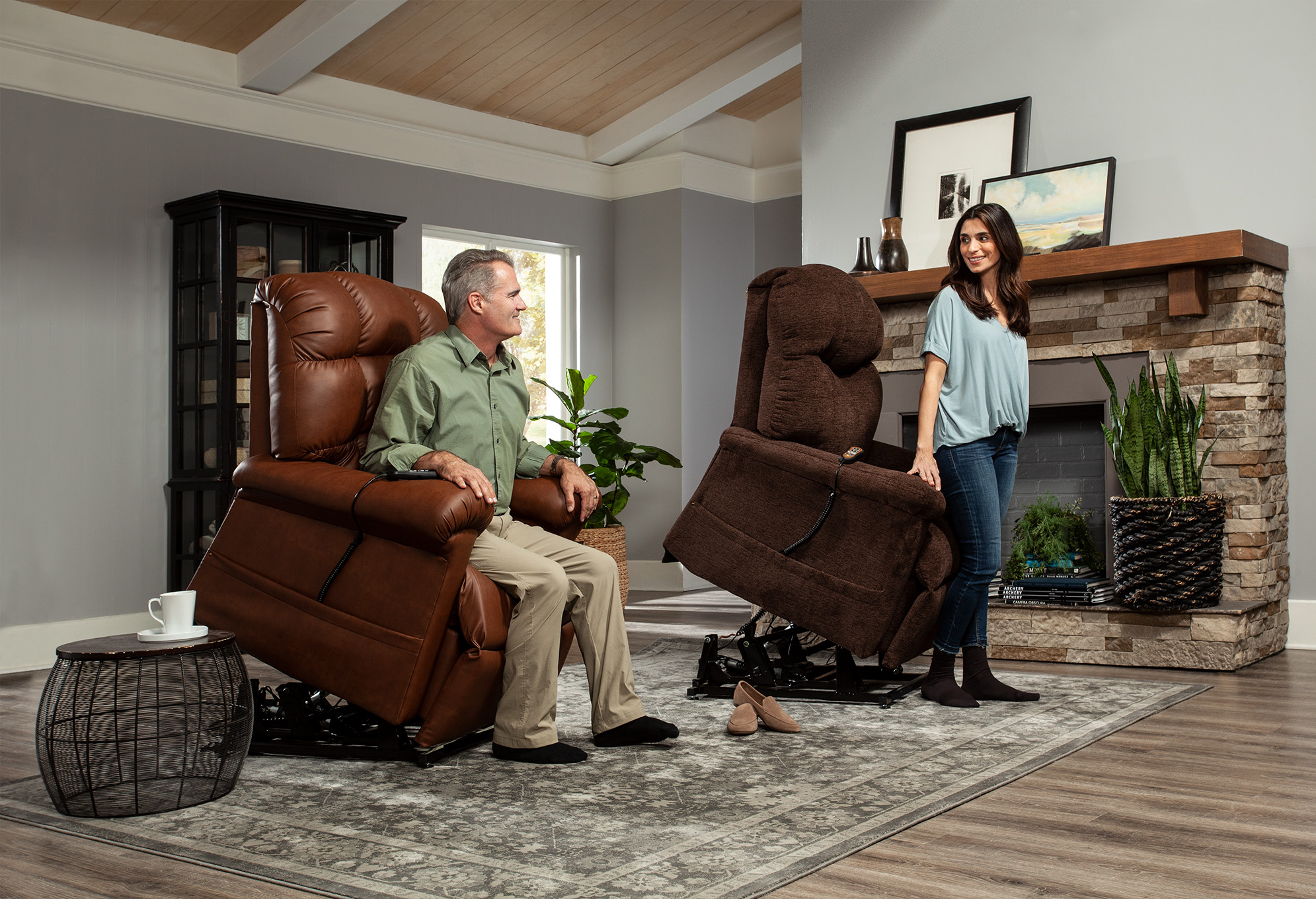 man and woman using lift chairs to stand up